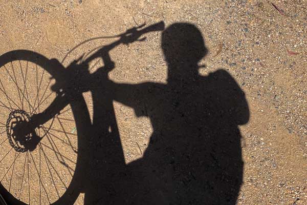 A shadow of Bianca on her bike